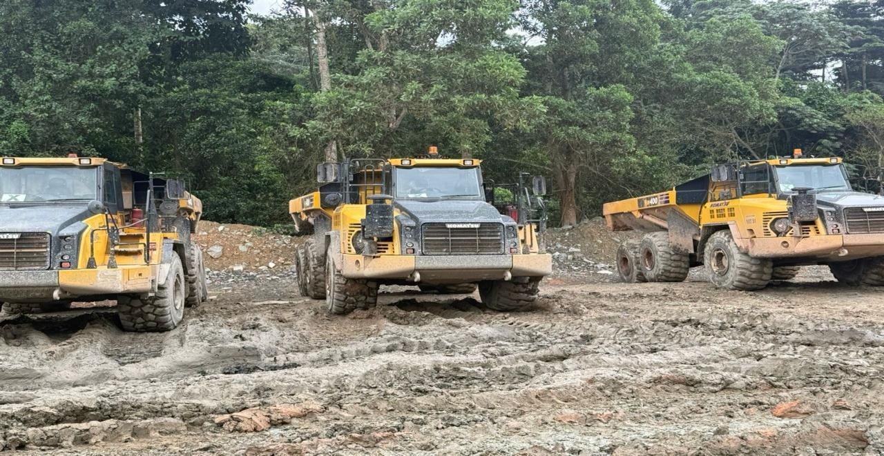 Yellow Power heavy equipment at an active project site